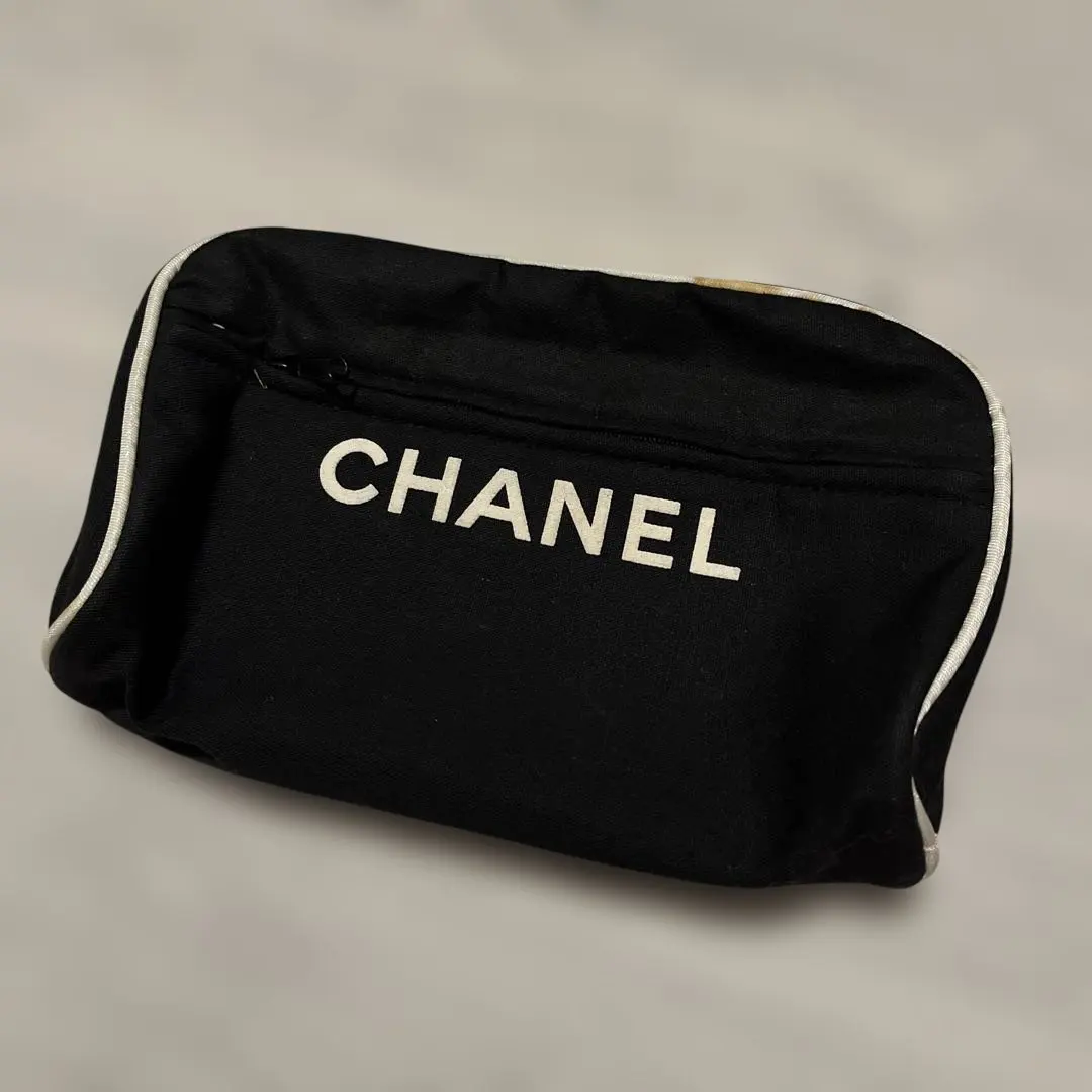 Thumbnail of Rare, scarce, unused Chanel novelty pouch with CHANEL logo
