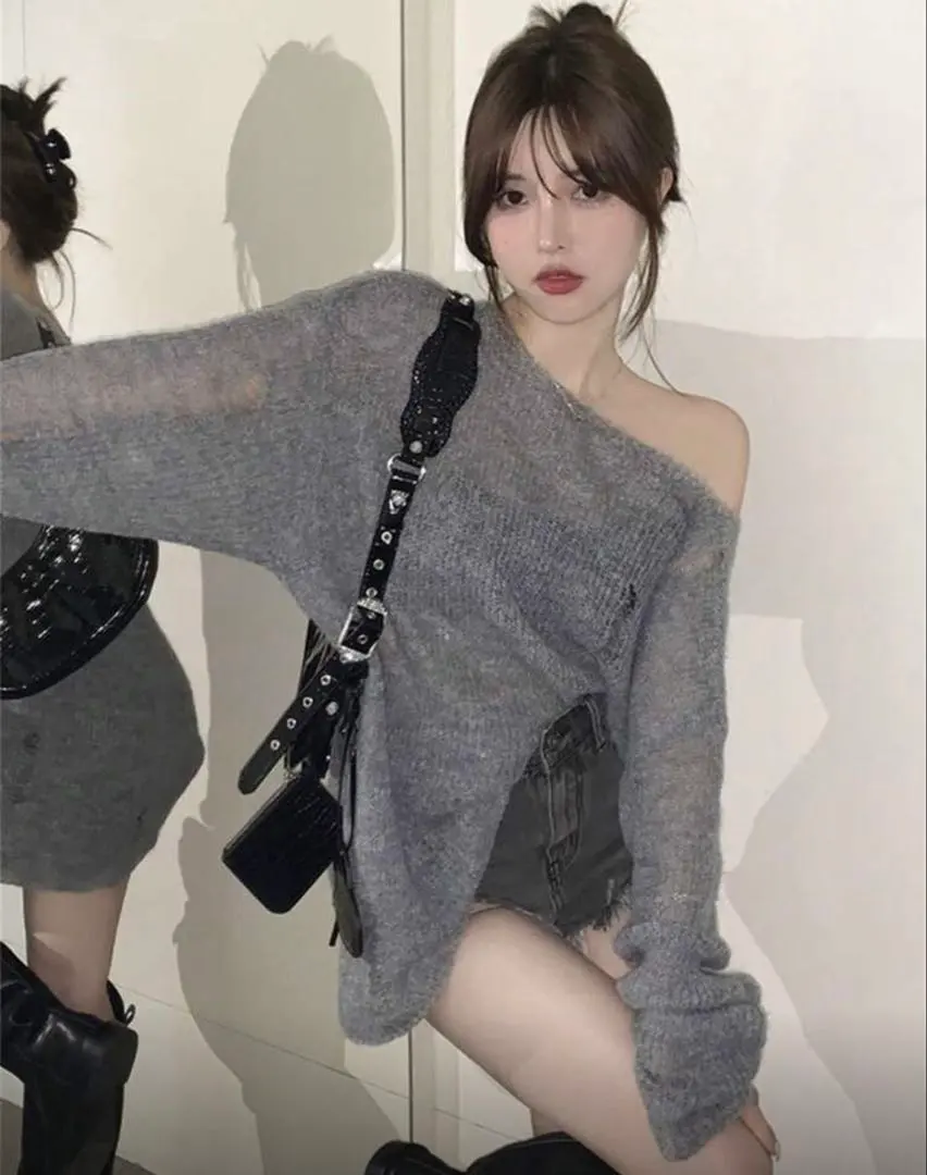 Thumbnail of Off-shoulder gray knit sweater