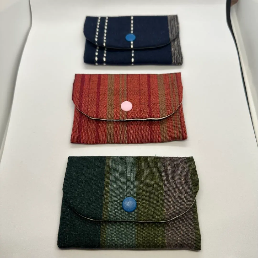 Thumbnail of Kasuri mini wallet set of 3, button closure