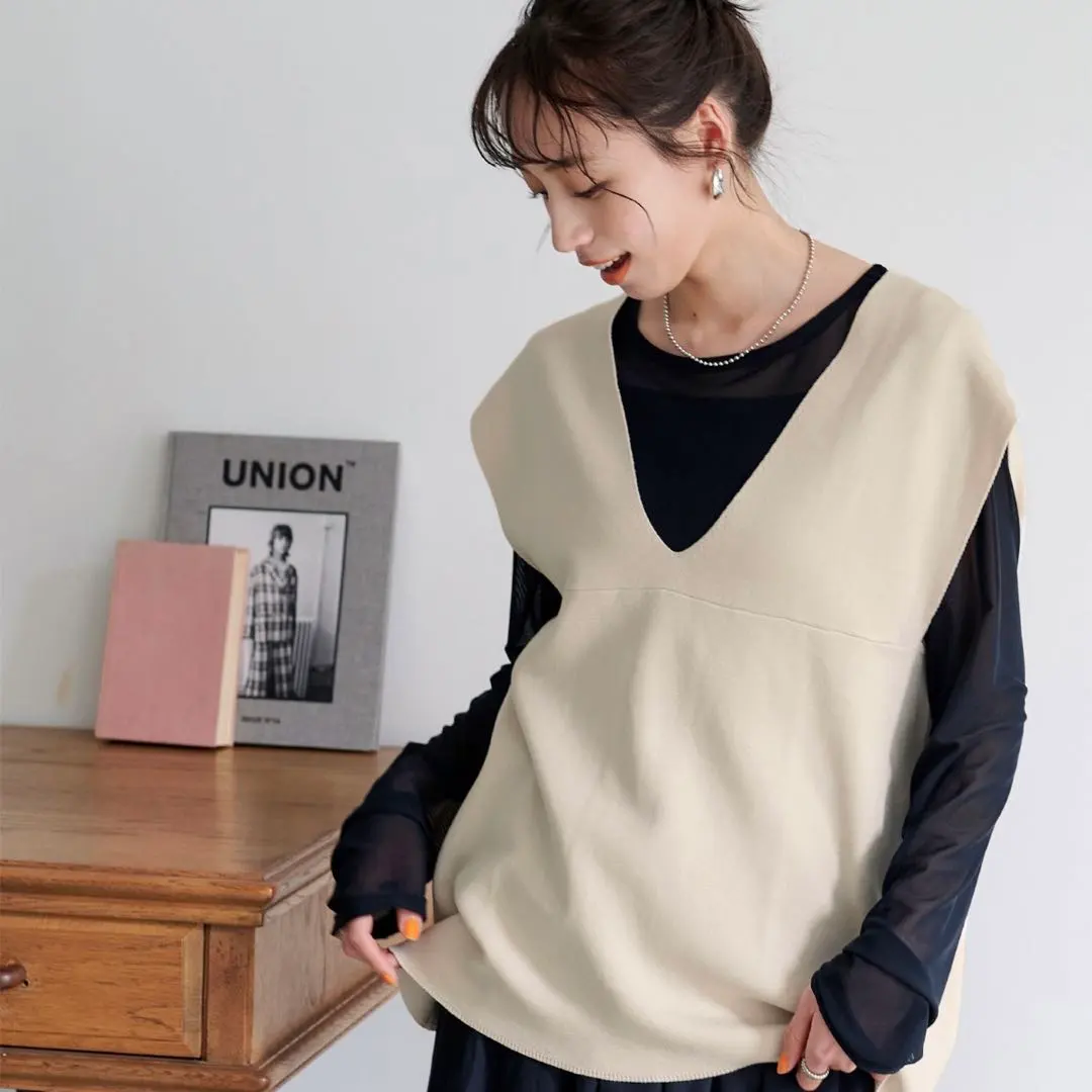 Thumbnail of Brand new, unused deep V-neck knit vest