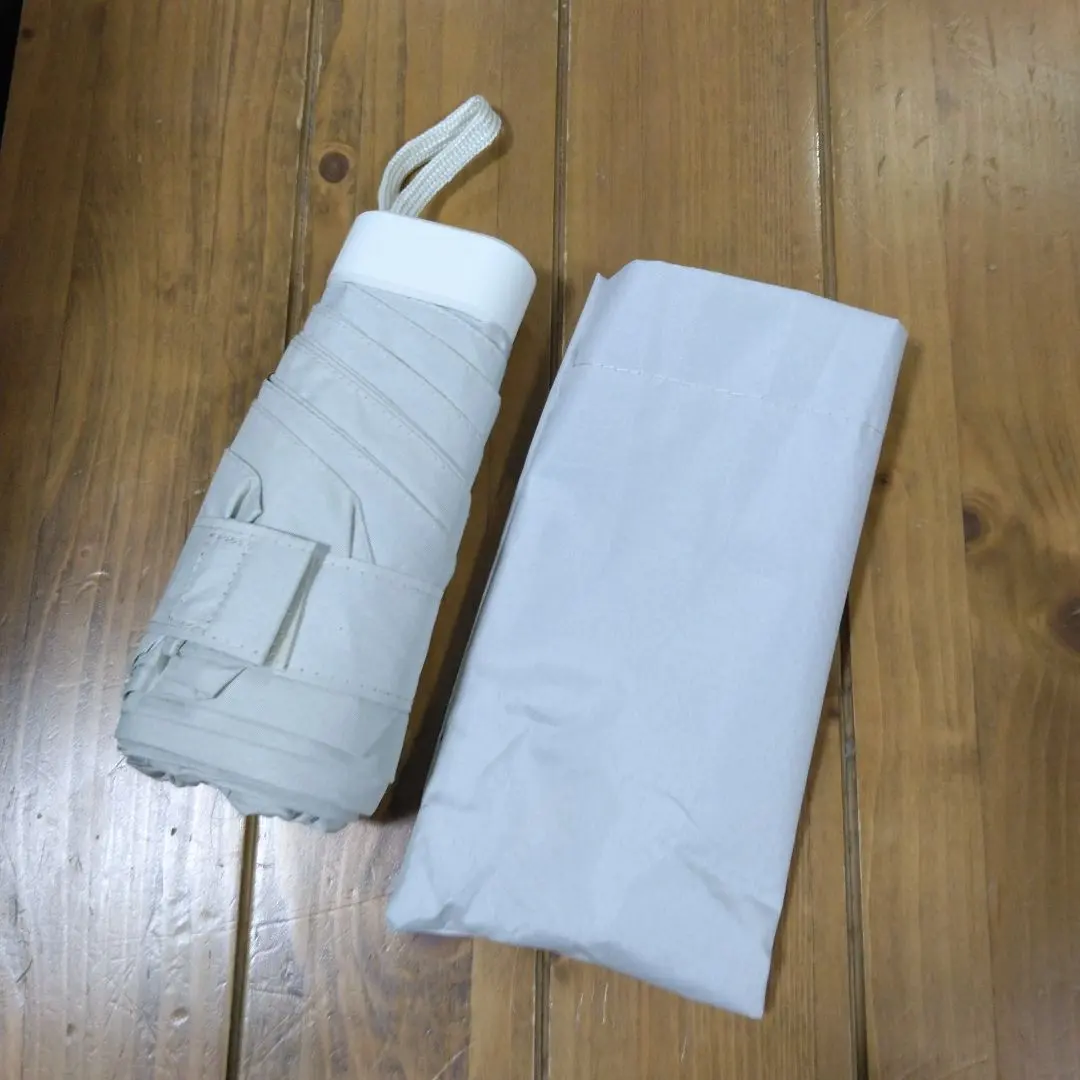 Thumbnail of Off-white parasol, sun/rain, foldable, 220g, new, UV protection, travel