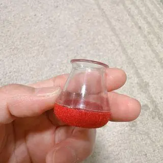 Thumbnail of Red glass flask-shaped empty bottle