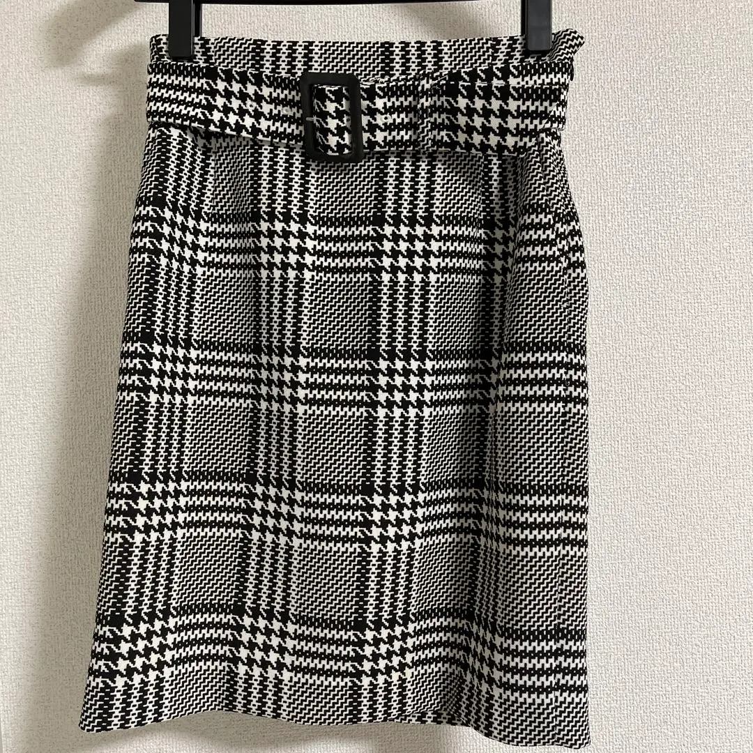 Thumbnail of Checkered tight skirt, size 36, with belt