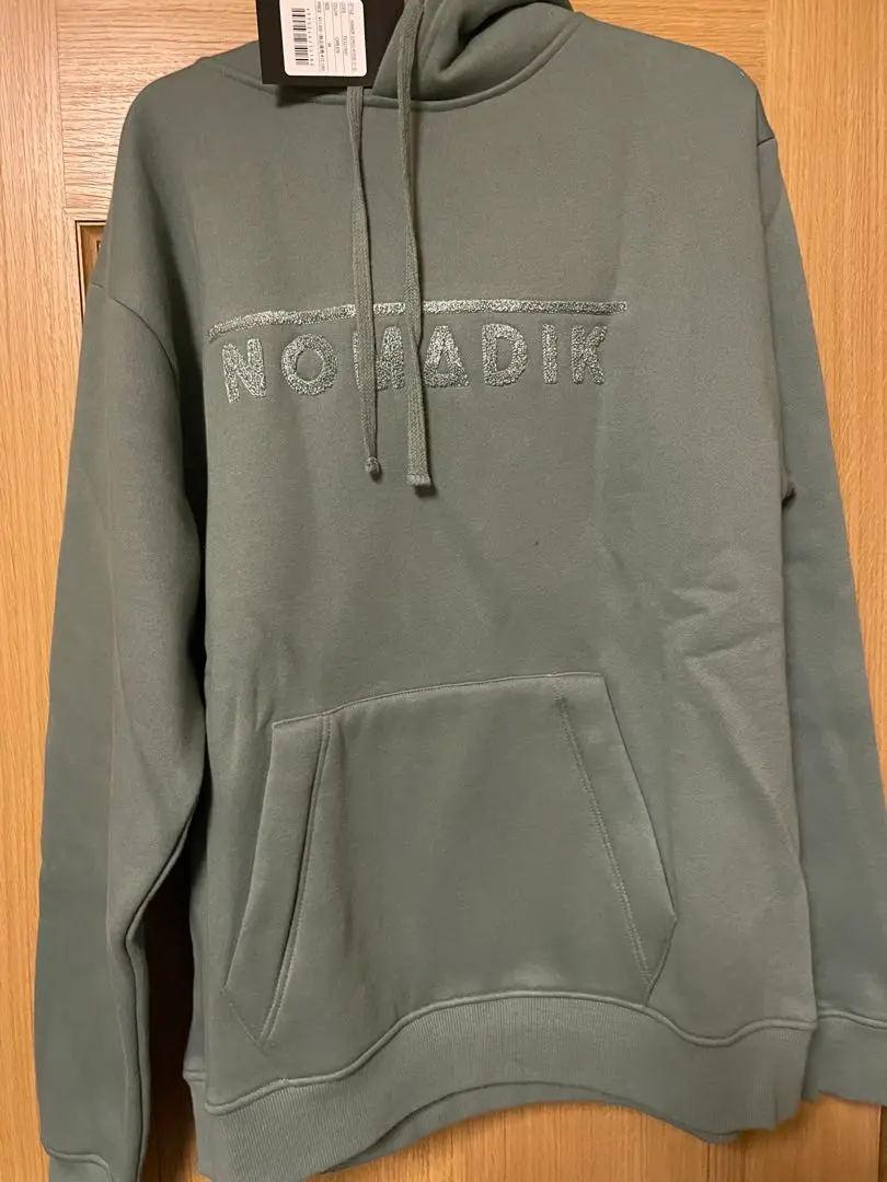 NOMADIK フード付きパーカー クリーム size L 新品未使用品