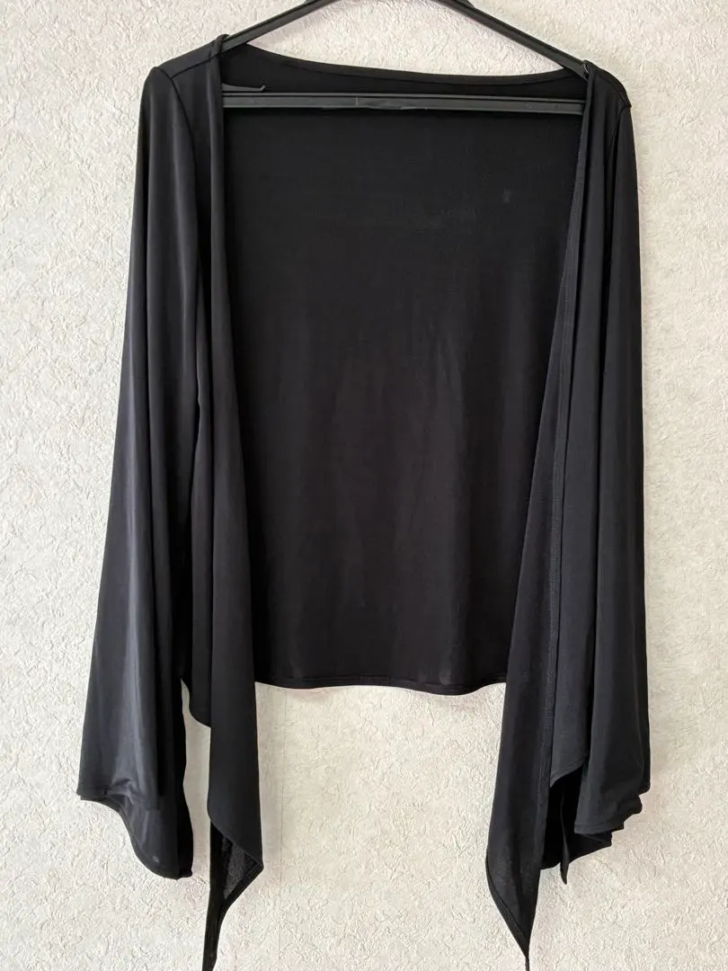 Thumbnail of Black long-sleeved cardigan, tied in front