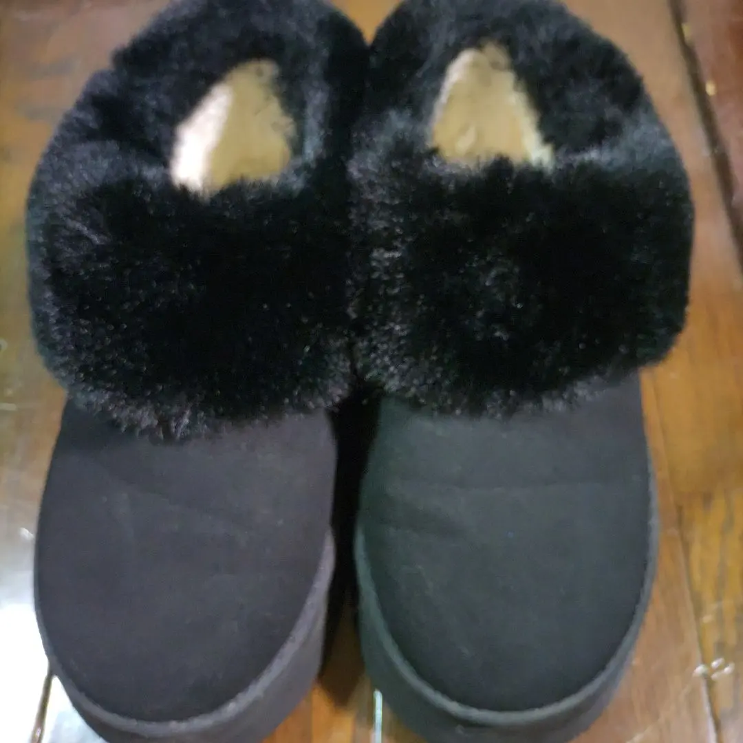 Thumbnail of Black faux fur-lined mukluk boots