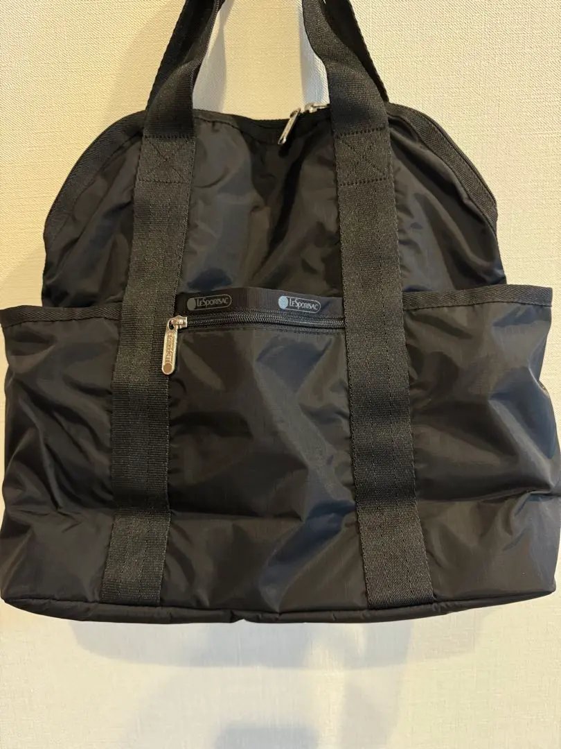 中古美品レスポートサック完売2442 リュックシャンパングリッター　ラメ日本限定 LeSportsac（レスポートサック）の「DOUBLE TROUBLE BACKPACK