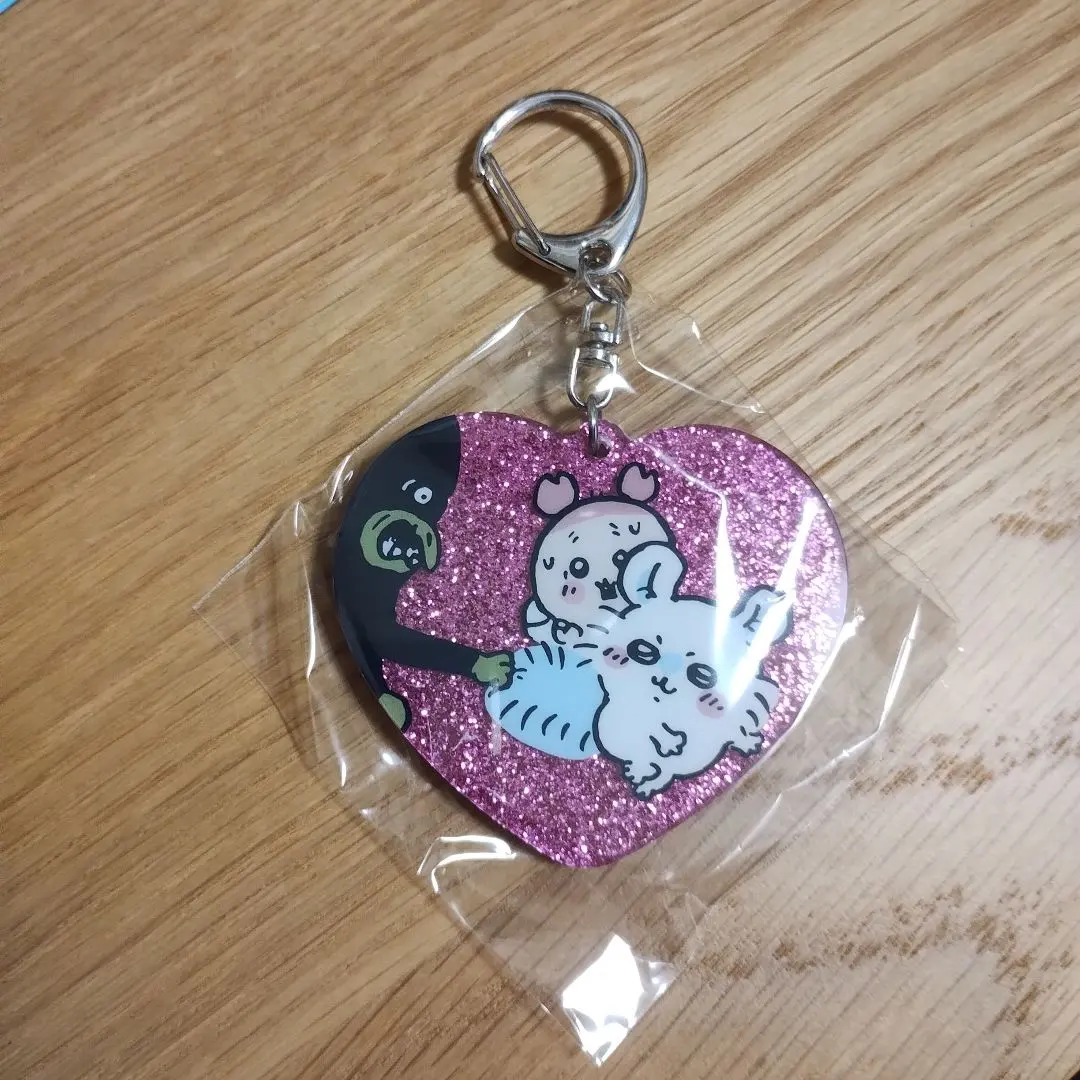 Thumbnail of Flying squirrel, used bookstore, heart-shaped glitter keychain
