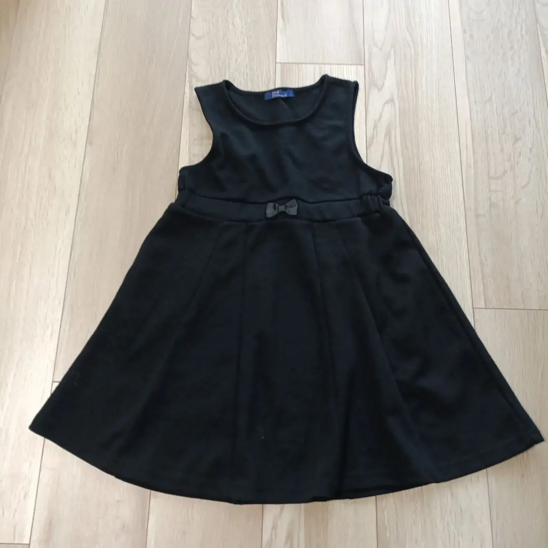 Thumbnail of Black dress with a ribbon