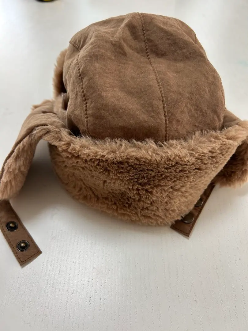 Thumbnail of Brown cap with ear flaps