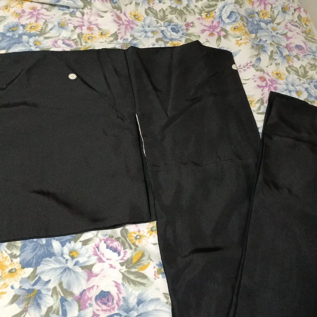 Thumbnail of Black mourning formal wear (with family crest), size 6, with long undergarment