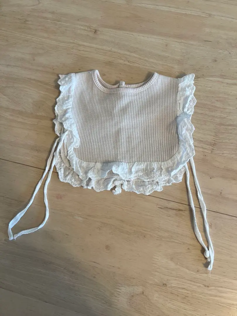 Thumbnail of Almost new baby frilly bib / drool catcher