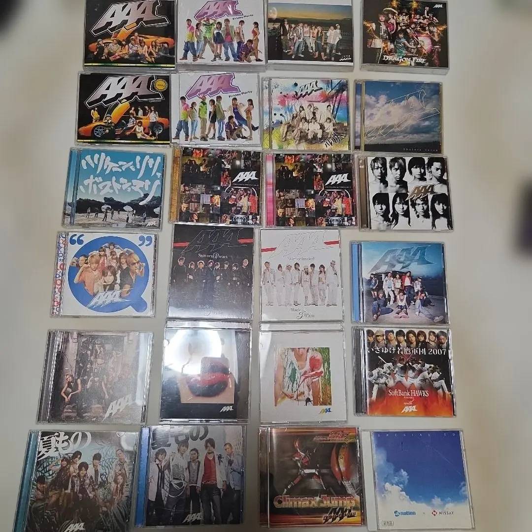 Thumbnail of AAA CDs, many with music videos, bundled together (more to be added)