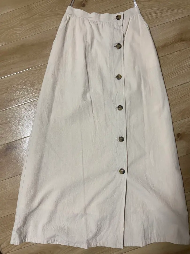 Thumbnail of Cream-colored long skirt with buttons