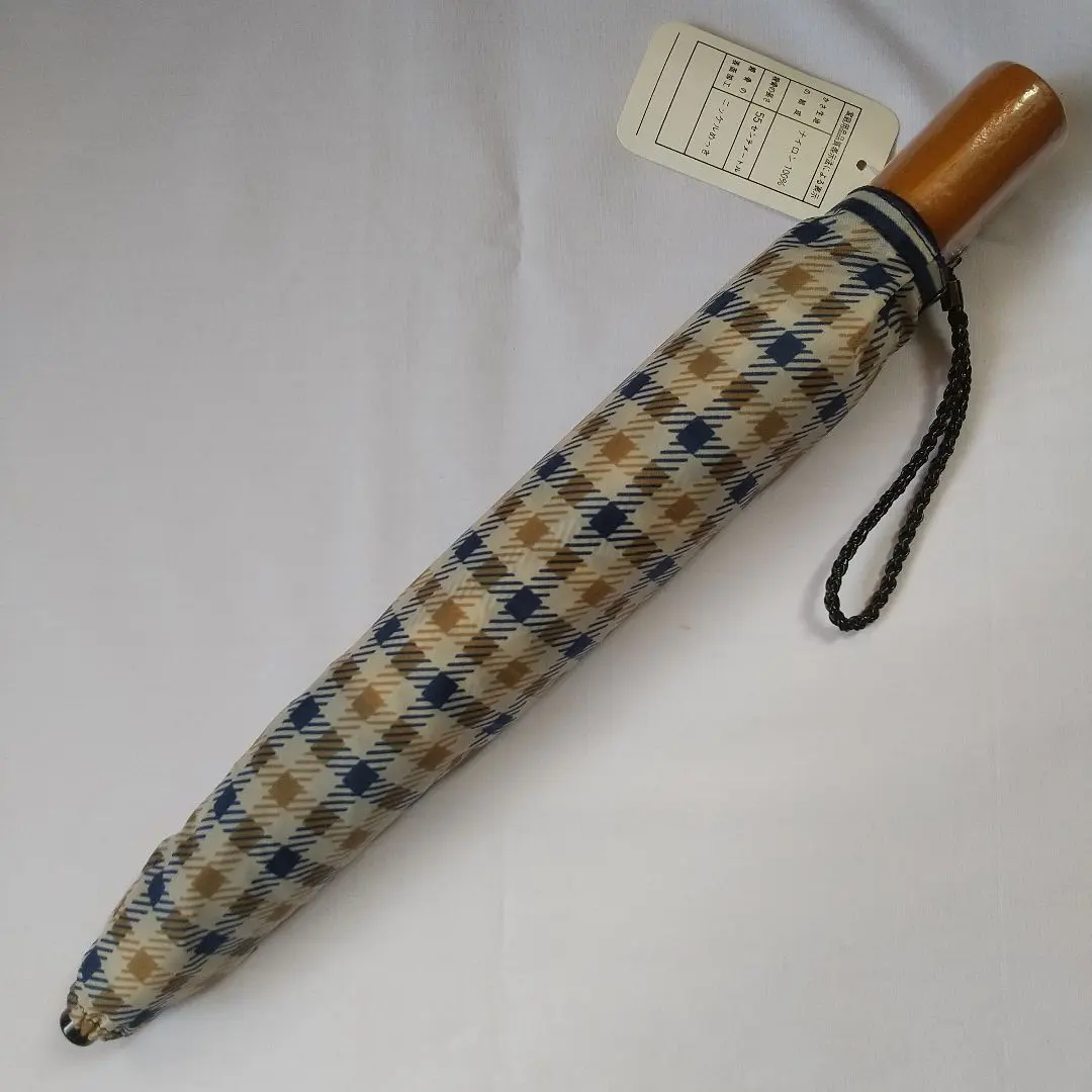 Thumbnail of Brand new, unused checkered folding umbrella