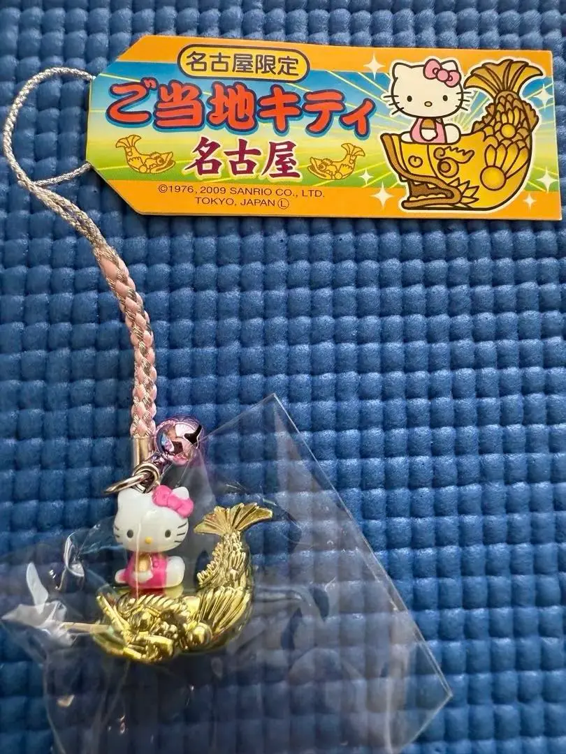 Thumbnail of Hello Kitty Netsuke Strap - Nagoya Limited Edition Gold Shachihoko