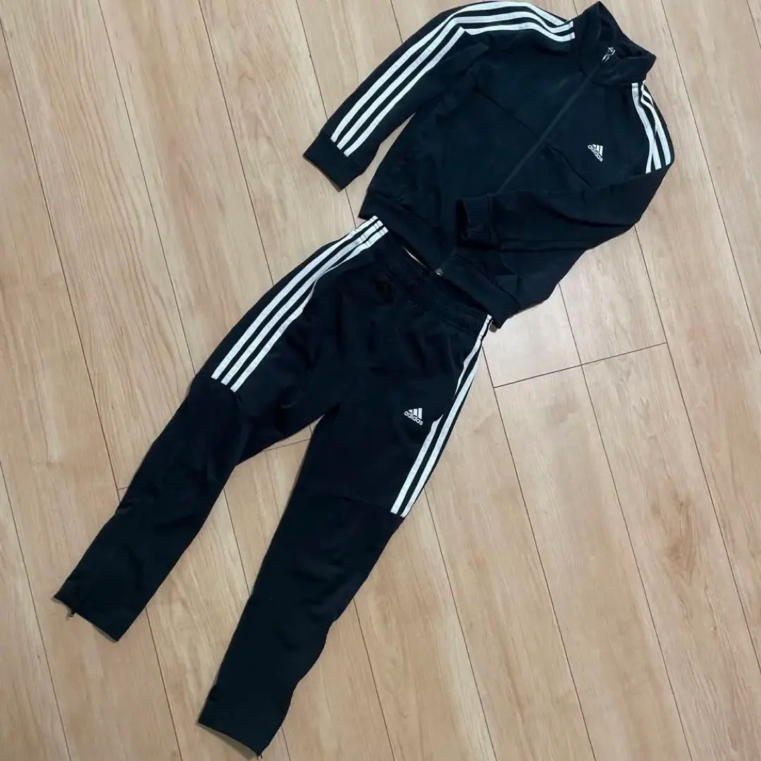 Thumbnail of Adidas black jersey set (top and bottom) 130cm