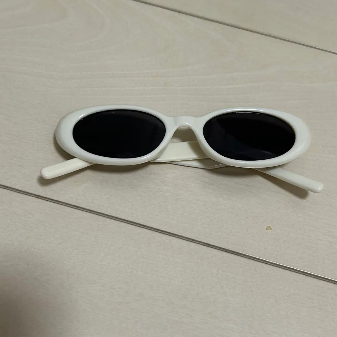 Thumbnail of White oval sunglasses, white