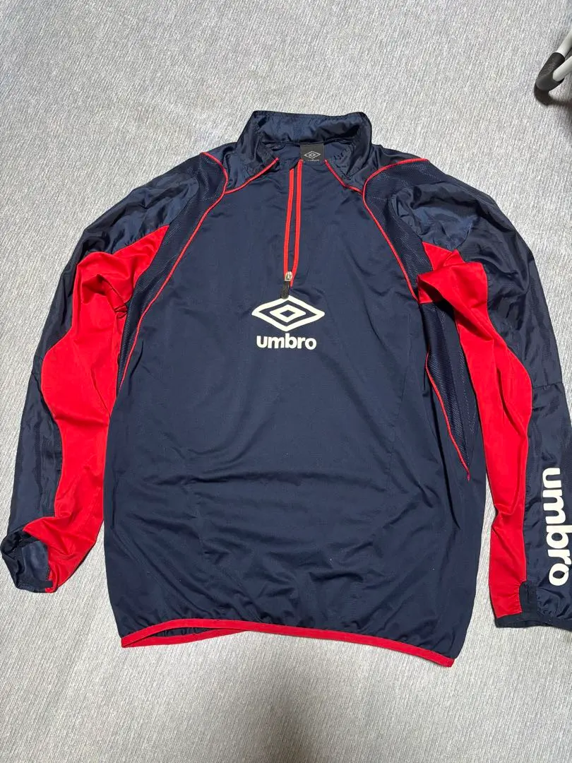 Thumbnail of Umbro Piste Windbreaker Navy/Red