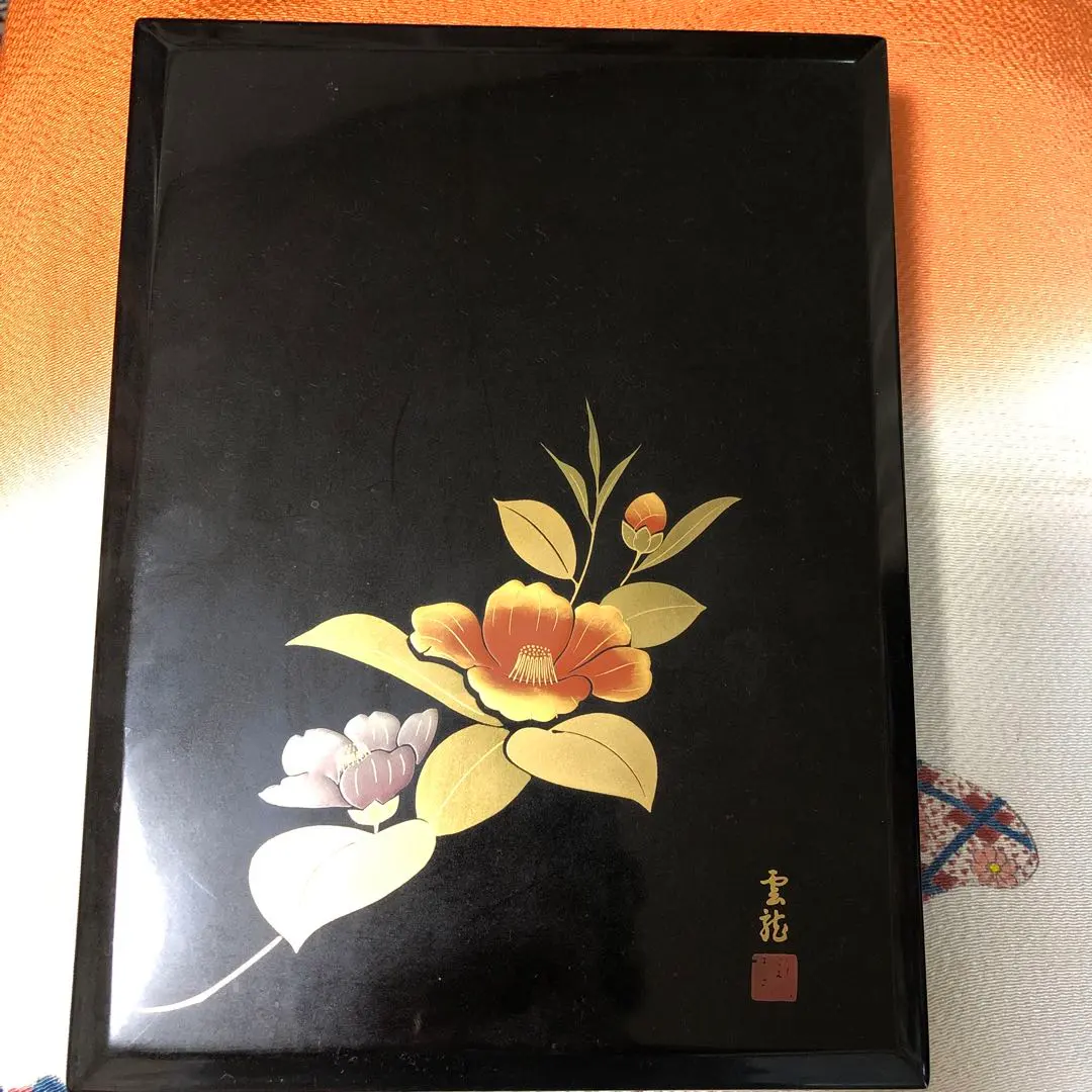 Thumbnail of Black lacquer writing box with gold and silver camellia design, made by Unryu.