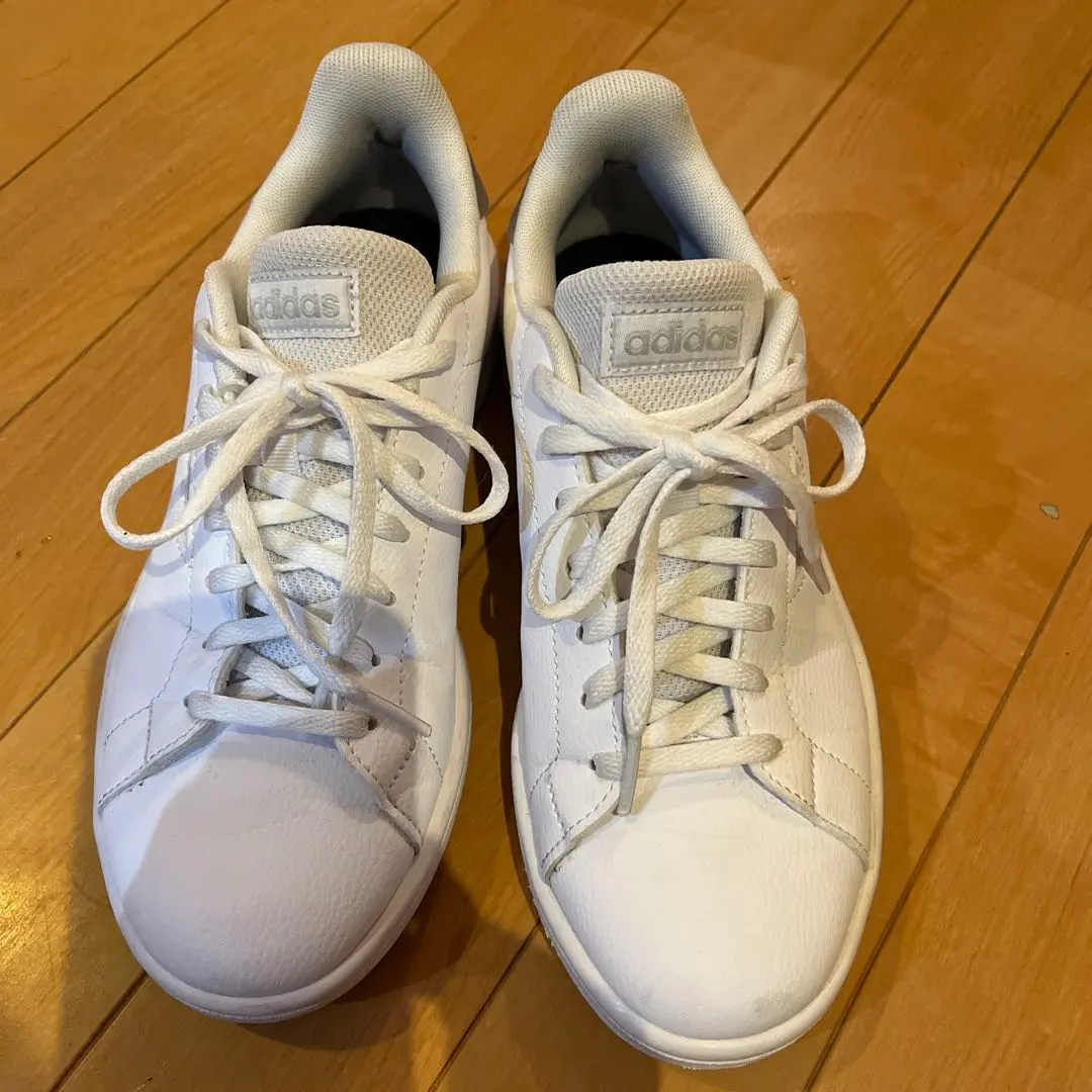 Thumbnail of Adidas white sneakers