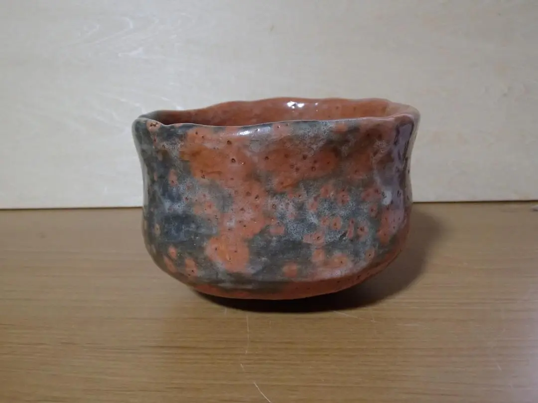 Thumbnail of Ubagamochi-yaki (Ubagamochi ware) Red Raku Tea Bowl. Note: See description.