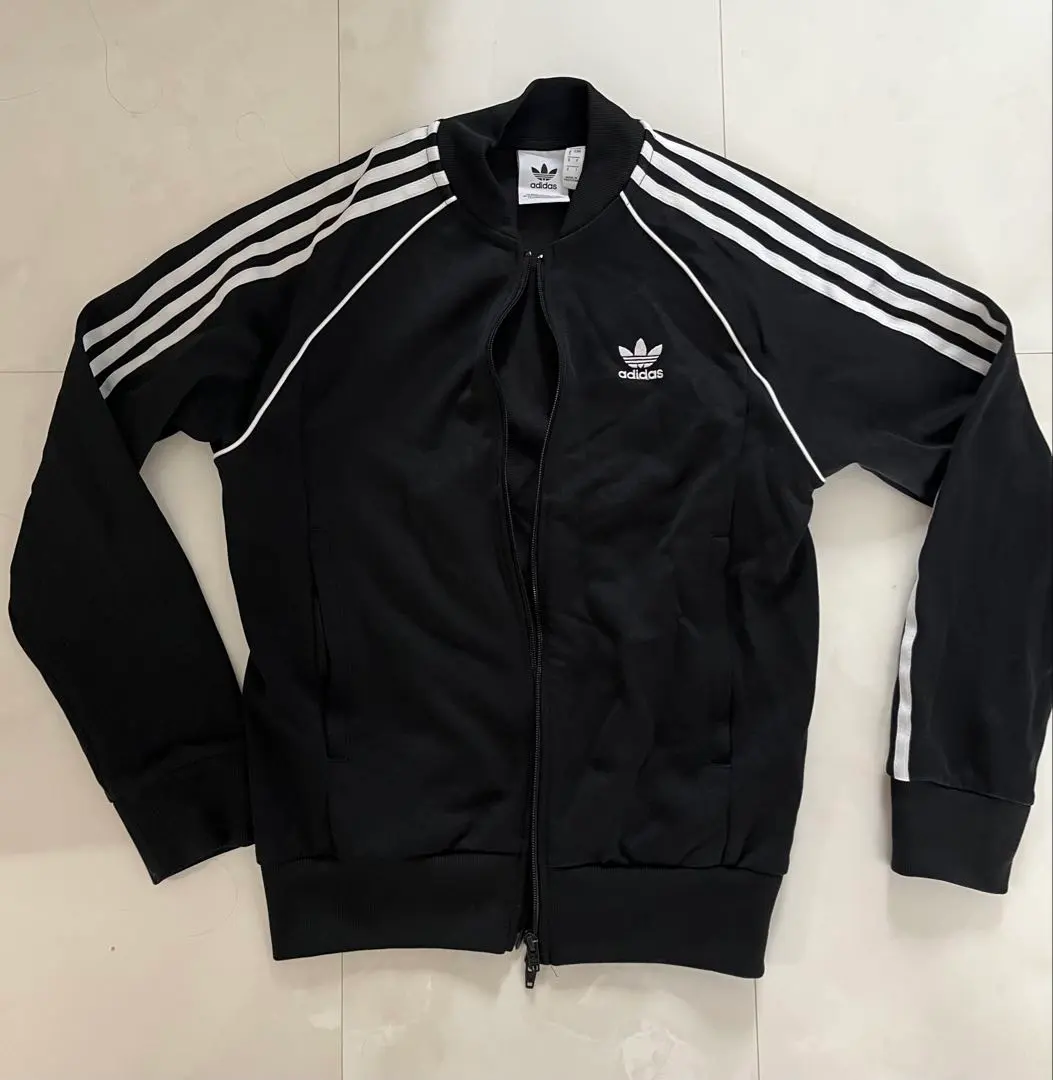 Thumbnail of Adidas black jersey stripes