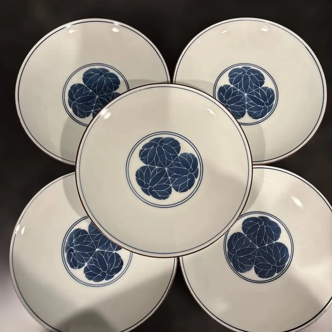 Thumbnail of Set of 5 plates with hollyhock crest pattern