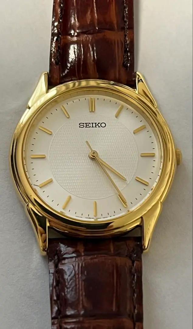 SEIKO セイコー V701-1920 クォーツ 腕時計ヴィンテージ s-l1200.jpg