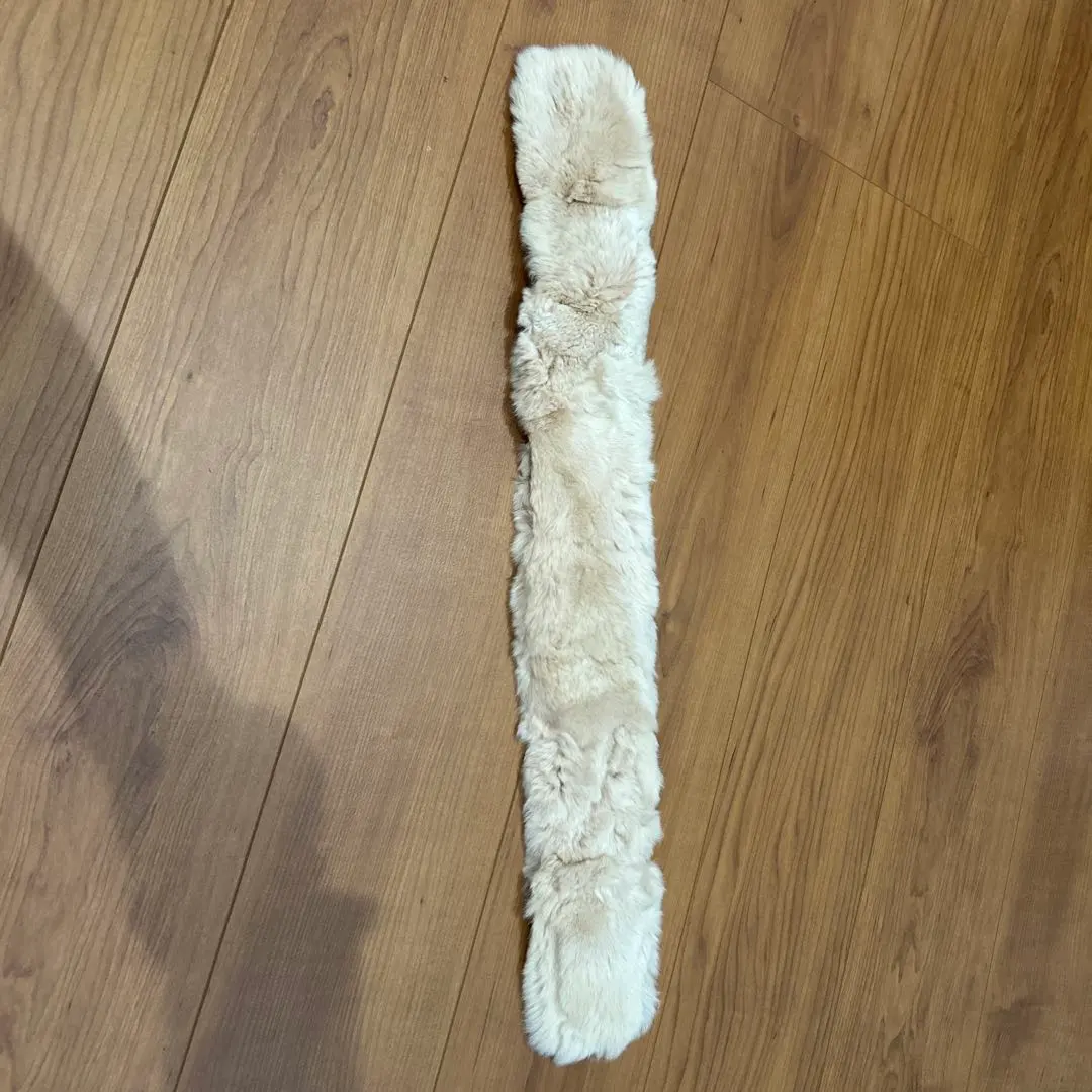 Thumbnail of Cream-colored faux fur muffler with clip, fluffy, smooth, and cute