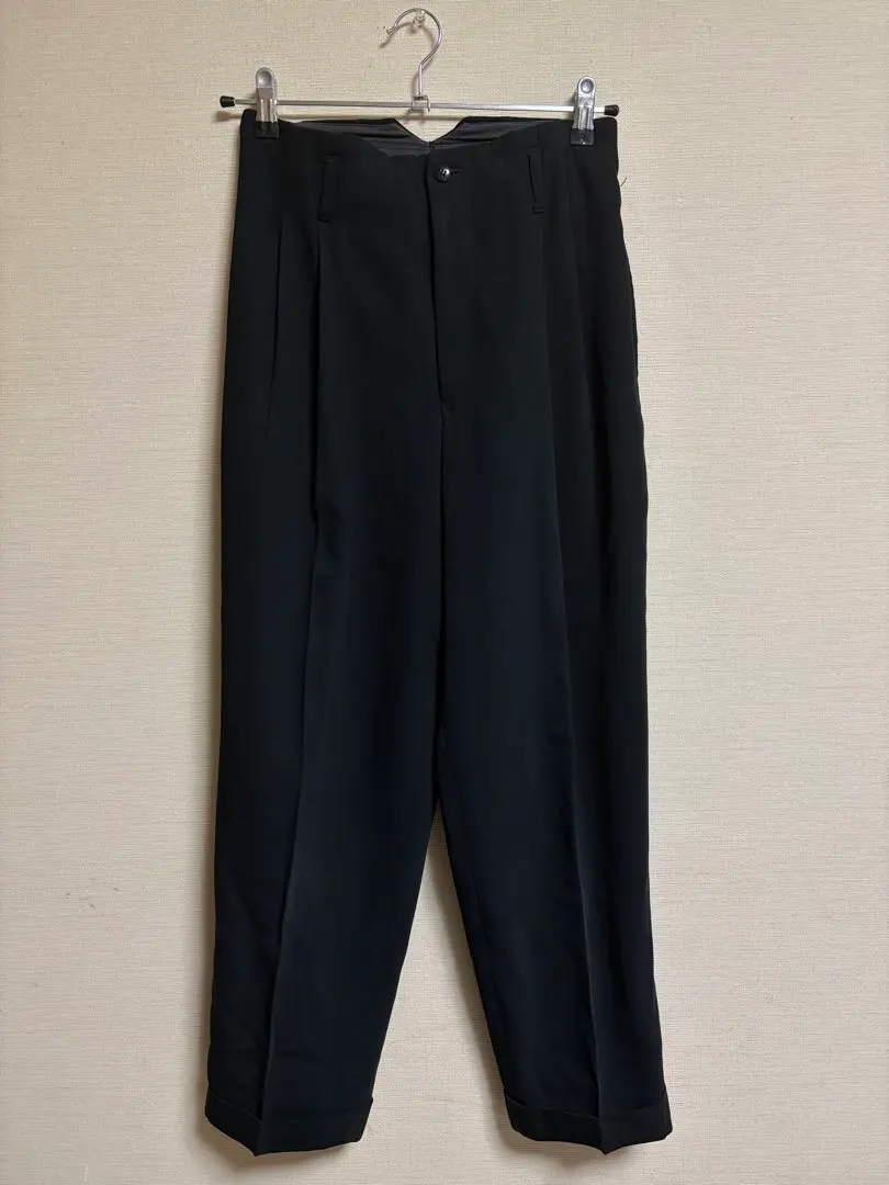 Thumbnail of Tuck-front black pants for women