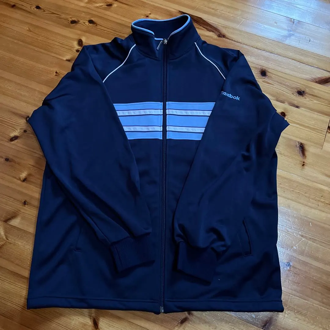 Thumbnail of Reebok track jacket, black with stripes