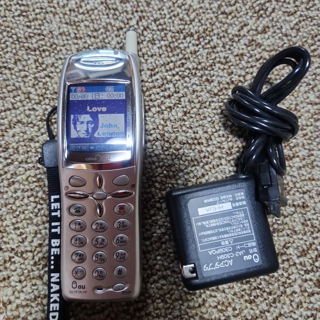 au c501SA シルバー ジョン・レノン 携帯 m52023576021_1.jpg?1665927171