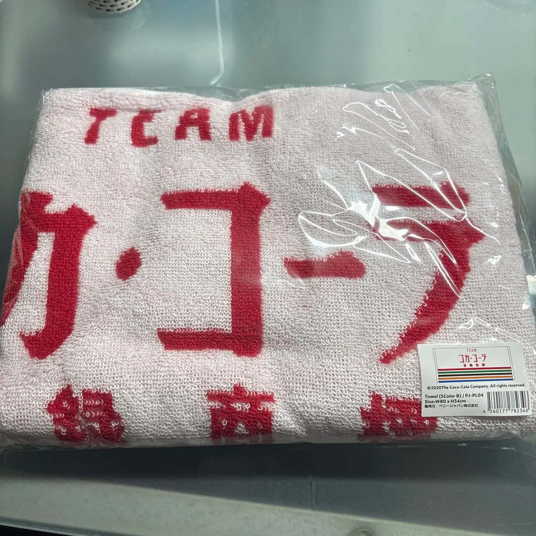 Thumbnail of Coca-Cola towel, new and unused