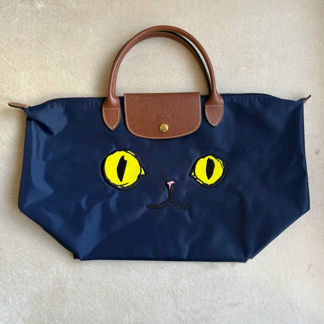 【本日発送】LONGCHAMP 猫の顔 レザー チャーム 本日発送】LONGCHAMP 猫の顔 レザー チャーム