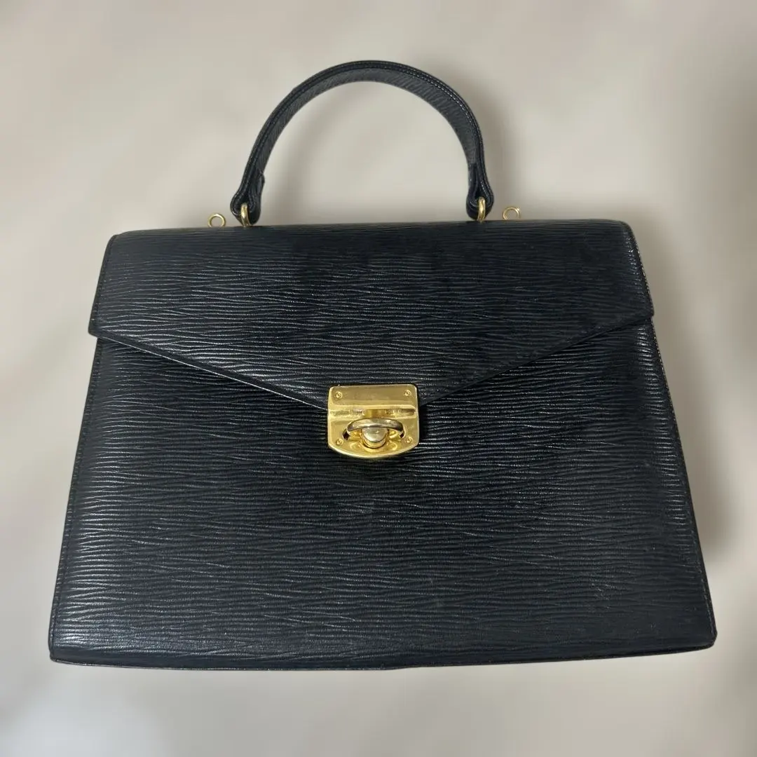 Thumbnail of Black leather handbag