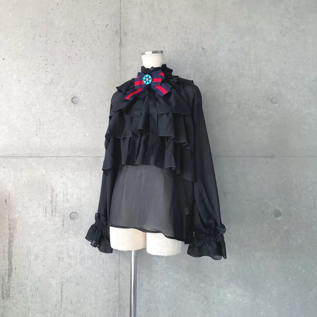 Thumbnail of New with tags, Sherry Line brooch attached, sheer chiffon frill blouse, black
