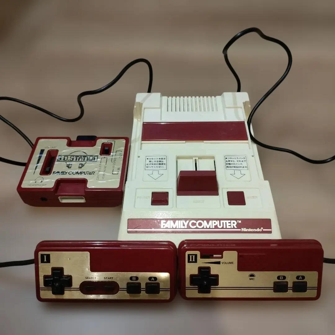 Thumbnail of Family Computer (Famicom) console with two controllers. * Junk item.