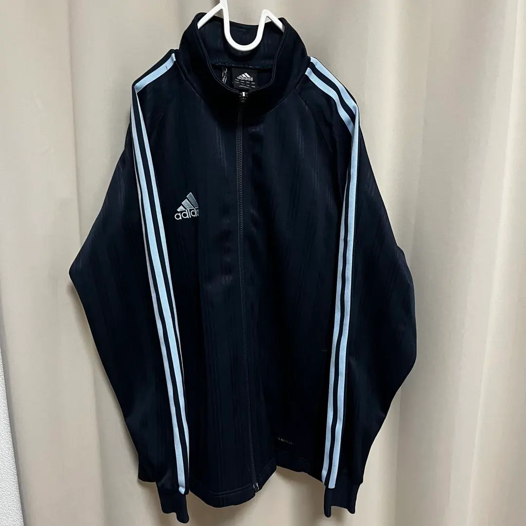 Thumbnail of Adidas track jacket, blue and navy