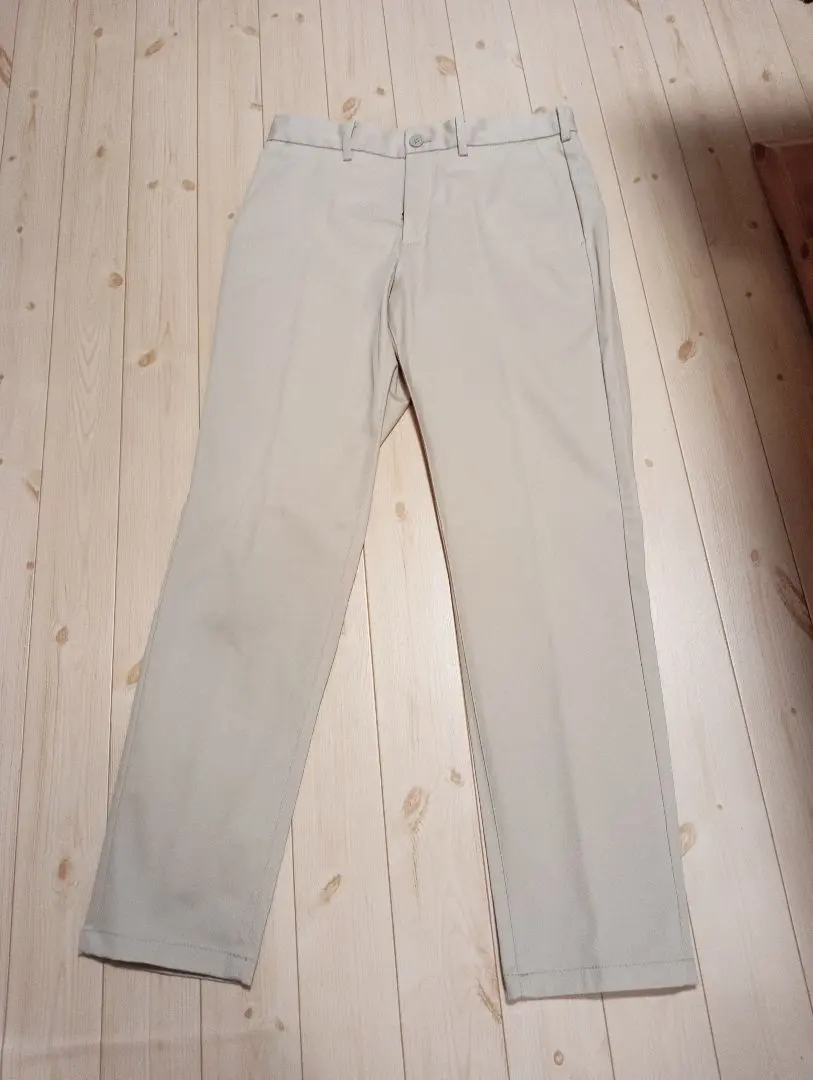 Thumbnail of Excellent condition! GU beige chinos, 79cm, with stretch.