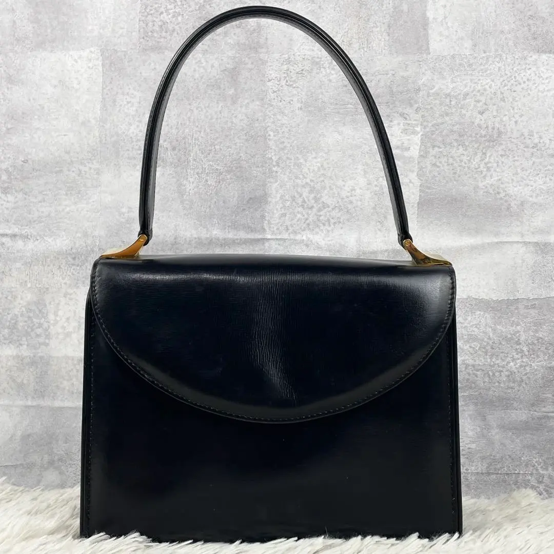 Thumbnail of Excellent condition Gucci leather tote bag, logo embossed, zipper, flap, formal