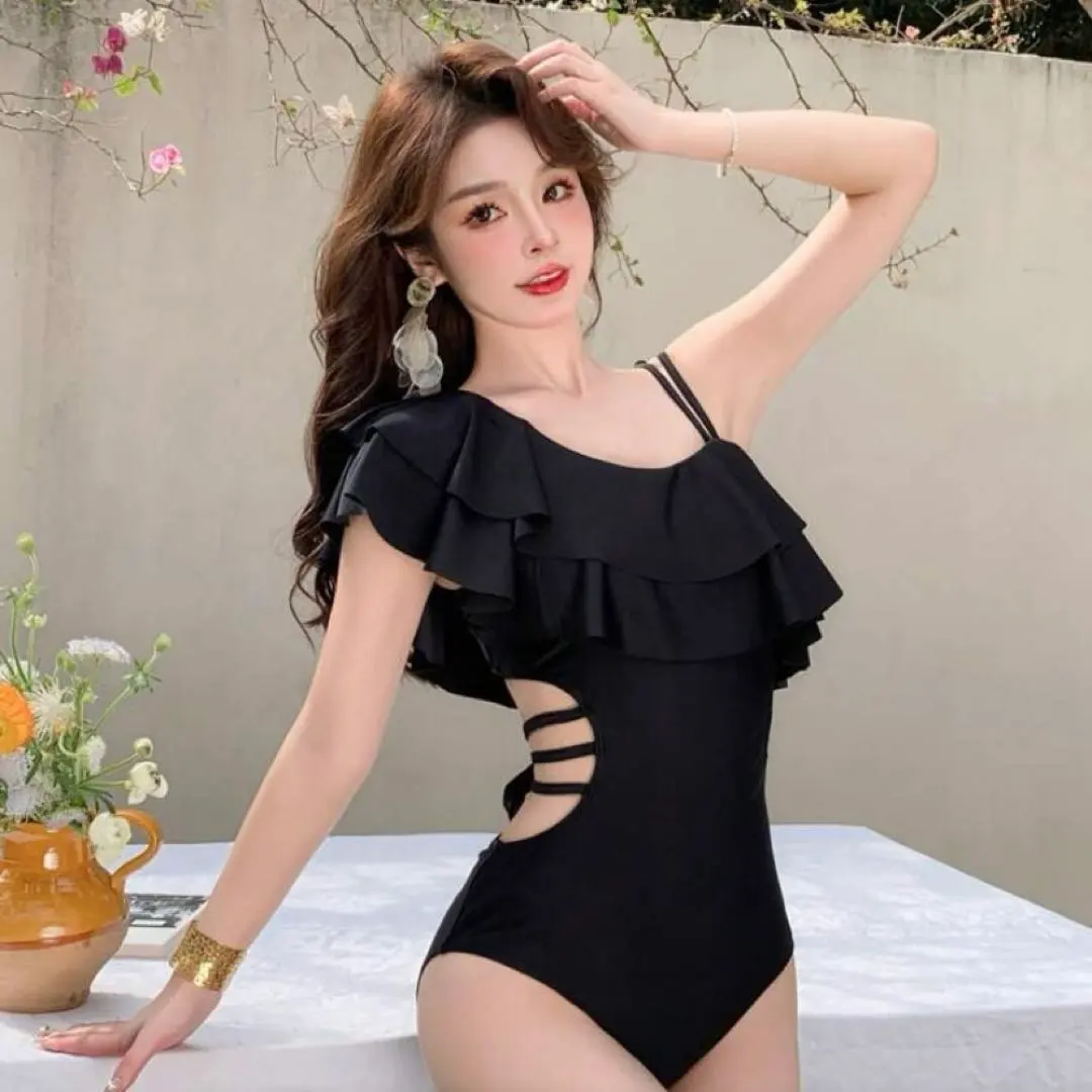 Thumbnail of Black one-piece swimsuit with frills