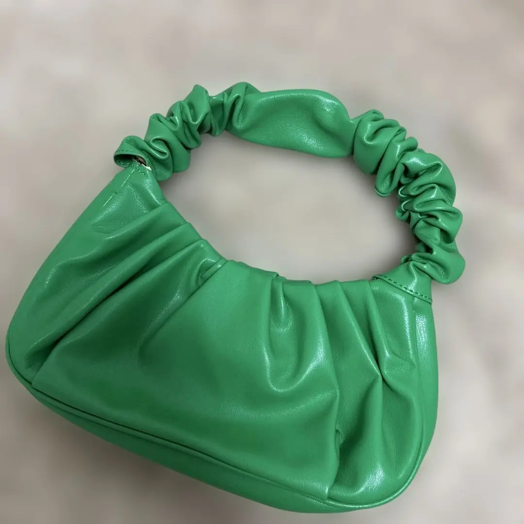 Thumbnail of Green smocking handbag