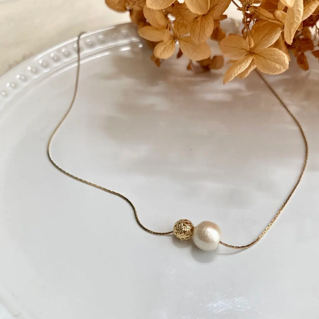 Thumbnail of Gold filigree bead x cotton pearl ✧ Simple necklace