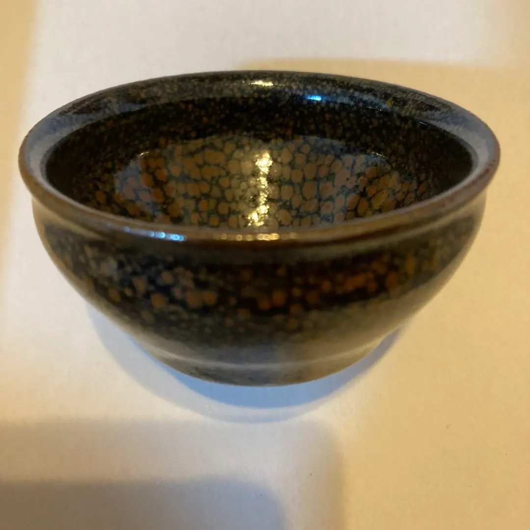 Thumbnail of Pottery sake cup, black and brown speckled pattern