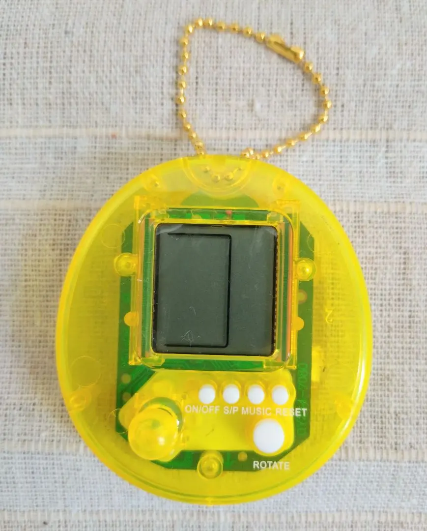 Thumbnail of JOY Digital Pet Toy, Yellow, with Instruction Manual