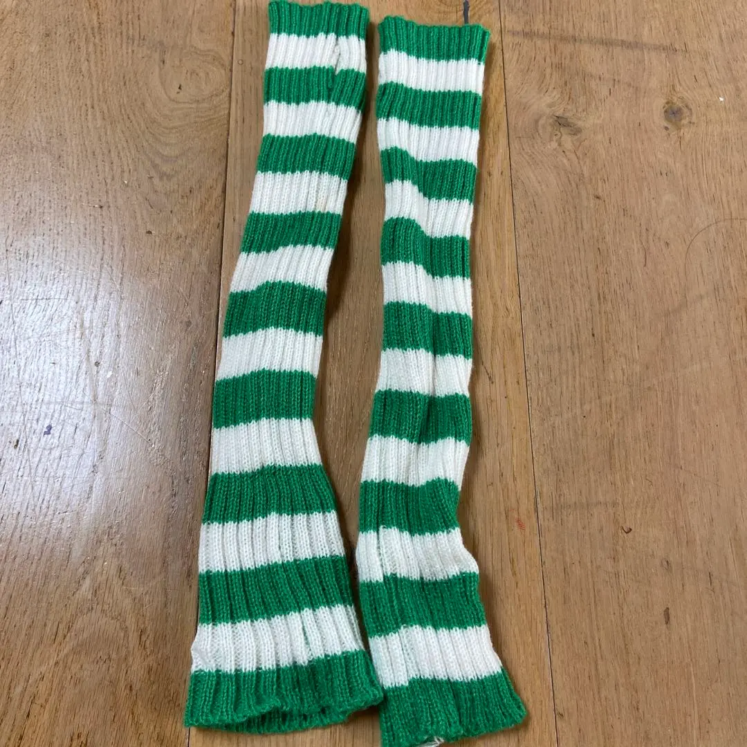 Thumbnail of Green and white striped arm covers
