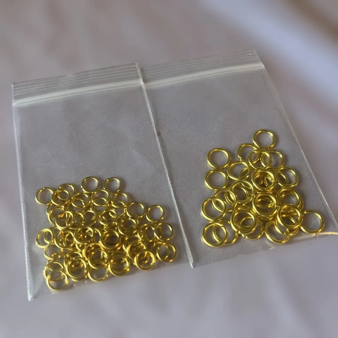 Thumbnail of Gold jump rings, large and small set