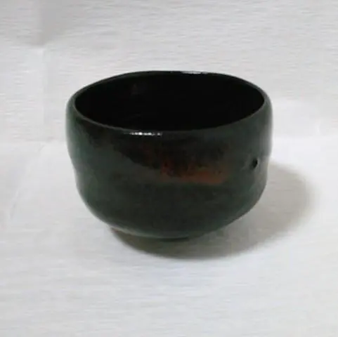 Thumbnail of Tea ceremony utensils: Raku tea bowl, black, Shorakku (?)