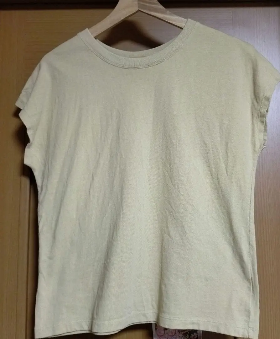Thumbnail of UNIQLO Pale Yellow Sleeveless T-shirt
